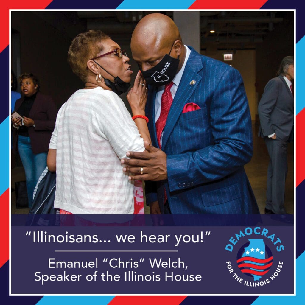 House Speaker Emanuel Chris Welch leans closely to hear constituent.