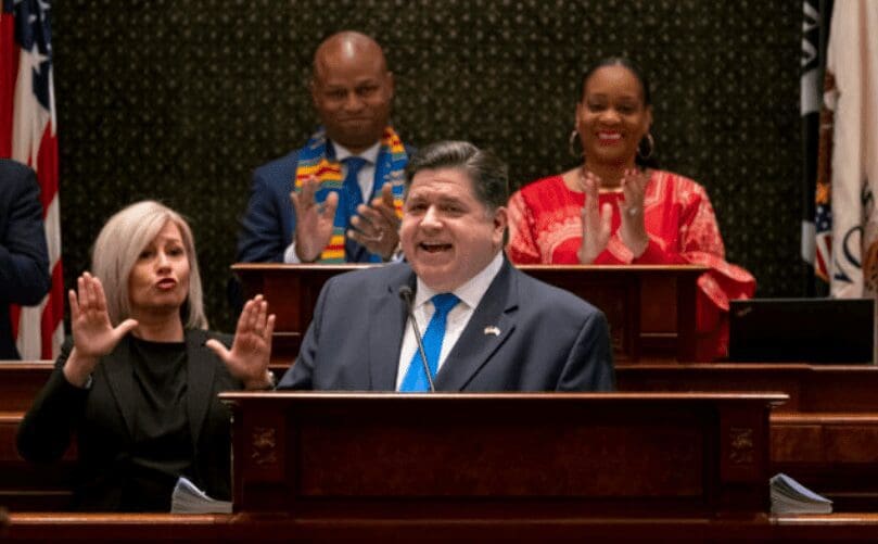 Gov. J.B. Pritzker delivers his combined budget and State of the State address in front of House Speaker Emanuel “Chris” Welch and Senate Majority Leader Kimberly Lightford to a joint session of the General Assembly on Wednesday, Feb. 15, 2023 at the Illinois State Capitol in Springfield, Ill. (Brian Cassella/Chicago Tribune via AP, Pool)