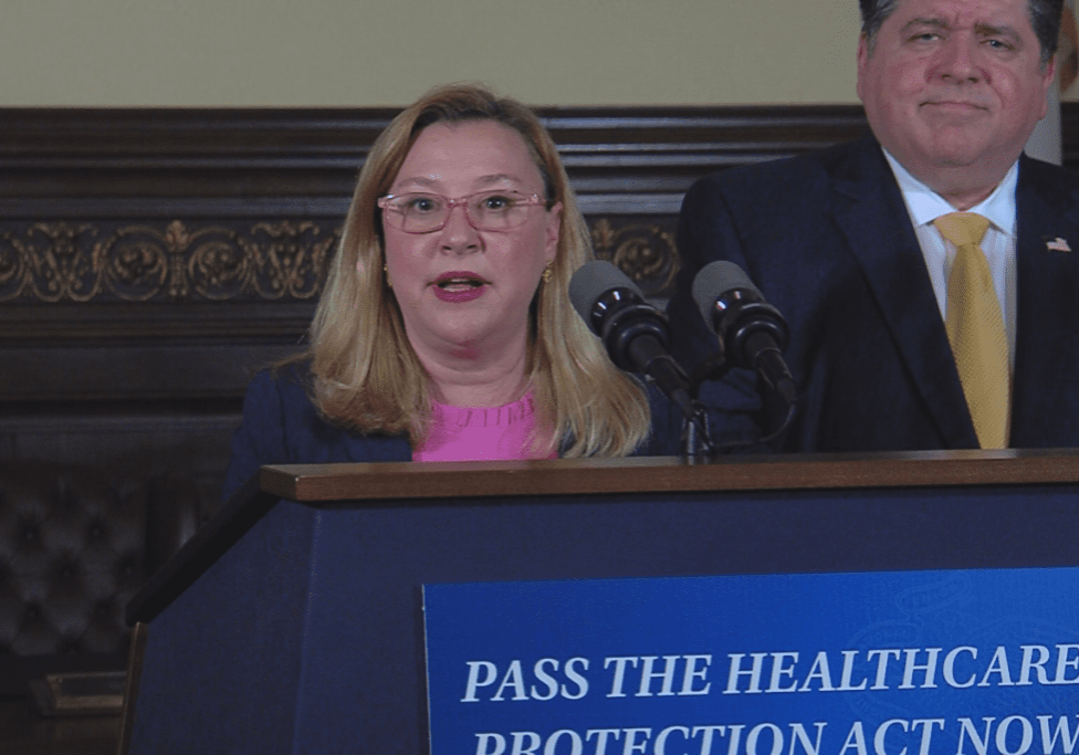 Rep. Anna Moeller (D-Elgin) spoke during a press conference alongside Gov. JB Pritzker after the House passed the Healthcare Protection Act on April 18, 2024.